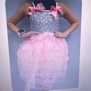Pink tutu with sequence body, comes with pink hair bow